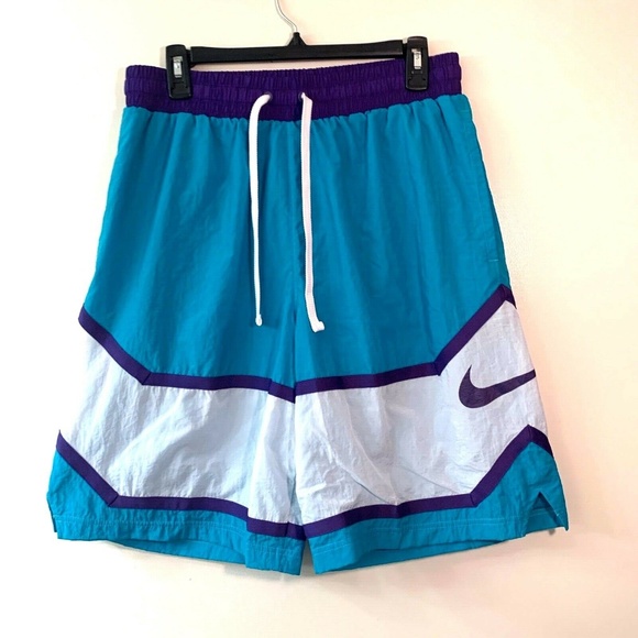 purple and white nike shorts